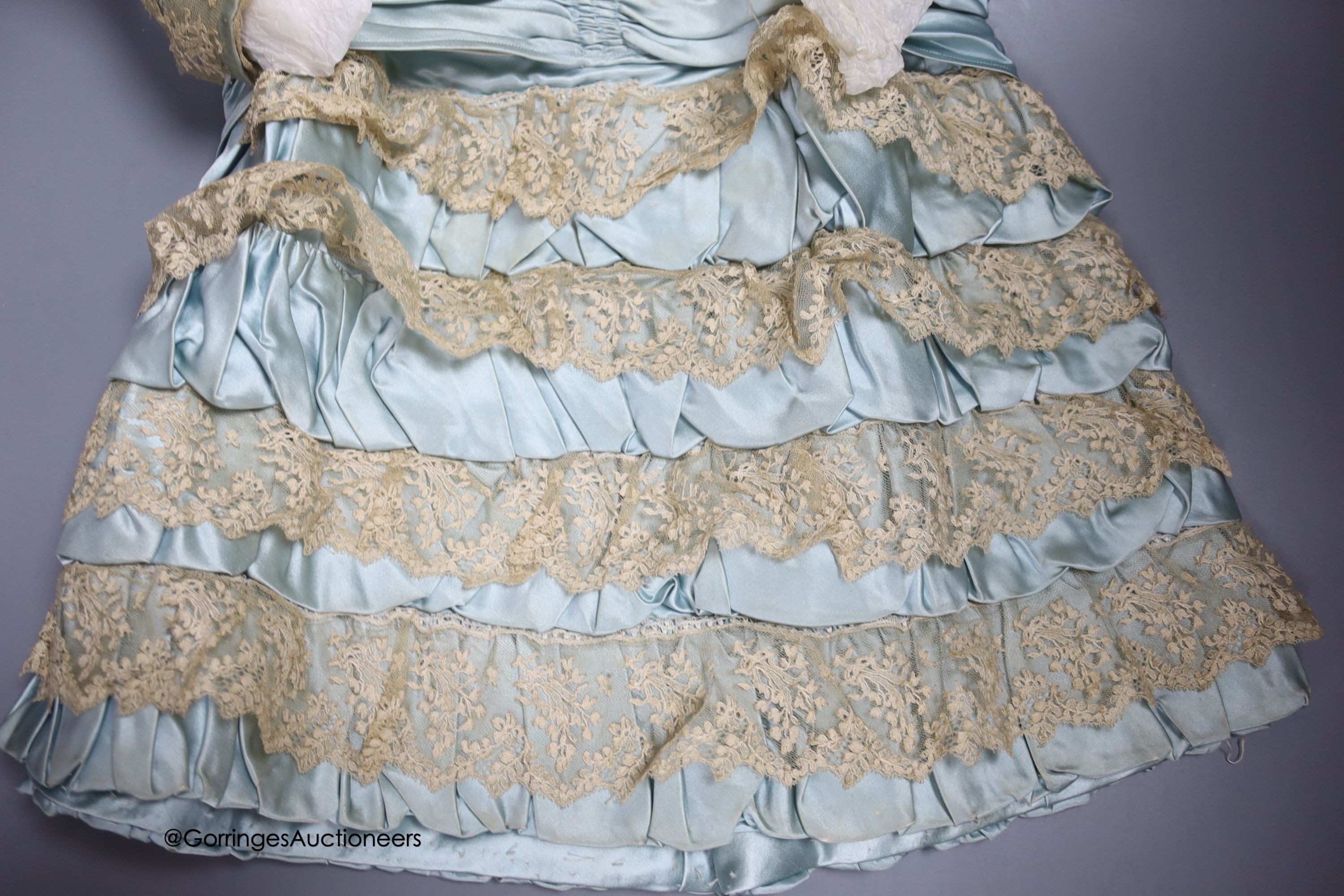 A Victorian silk and lace bordered dress